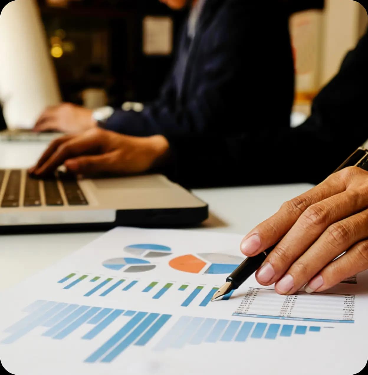 Finance team reviewing charts